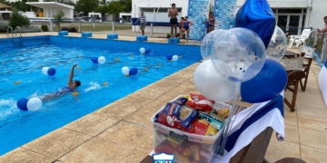 Sp. Rivadavia realizó la jornada de nado solidario y entregó alimentos a la Casa de la Niña